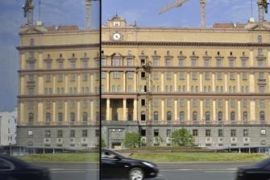 This file photo shows the main building of the Russian Federal Security Services, FSB, reflected in a shop&#039;&#039;s glass door on Lubyanka Square in Moscow [Ivan Sekretarev/AP]