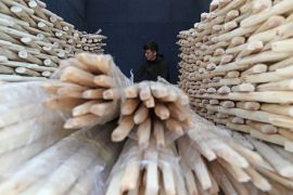 A volunteer places parts of a yurt, a traditional nomadic tent that can be used to keep people warm in freezing weather, in a truck while preparing a shipment of aid for residents of Ukraine, in the village of Kainazar in the Almaty region, Kazakhstan February 1, 2023. REUTERS/Pavel Mikheyev TPX IMAGES OF THE DAY